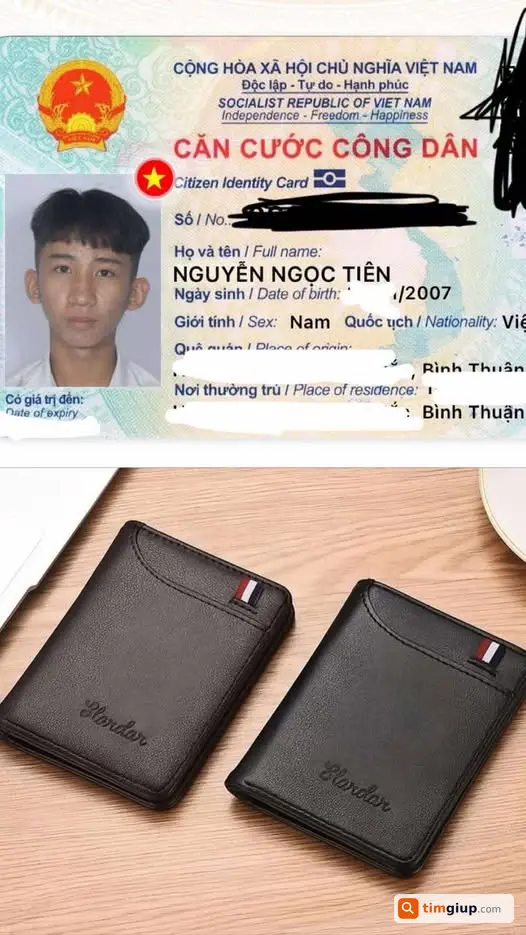 Mất ví đen chứa giấy tờ tại cầu Bình Phước, Q12