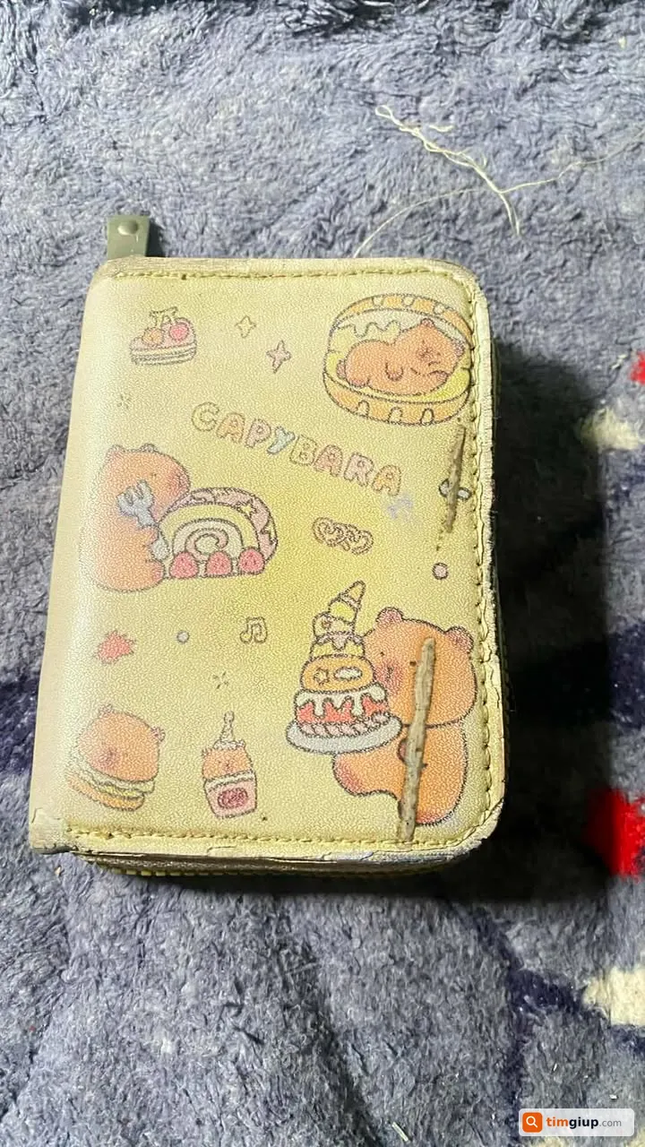 Tìm ví màu tím chứa giấy tờ của Nguyễn Thị Nhung tại Đà Nẵng